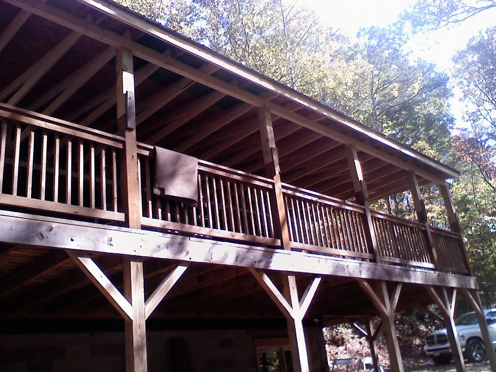 Timber framing under a new elevated porch and deck — Roof Leak Repair in West Cornwall by Roofing Brothers